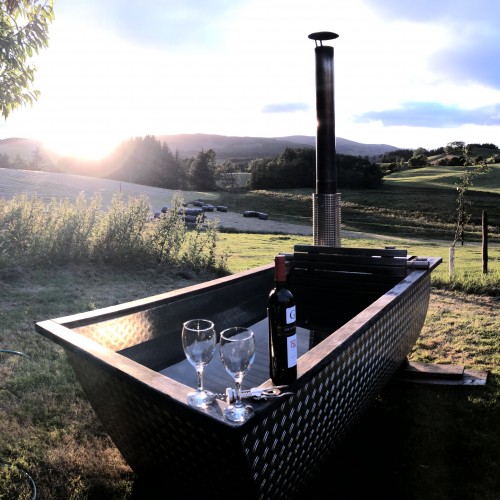 Wood Fired Hot tub (for pods only) at Glenshee Glamping