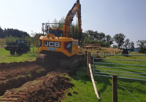 diggers in for new pathways in maintenance Nove...